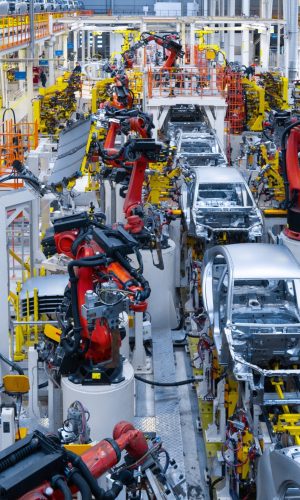 assembly-line-production-new-car-automated-welding-car-body-production-line-robotic-arm-car-production-line-is-working (1) (1) (1)