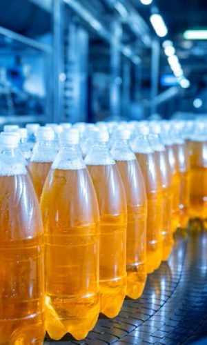 conveyor-belt-with-bottles-juice-water-modern-beverage-plant_179755-15860